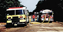 Fire tanker shuttle drill at fill site